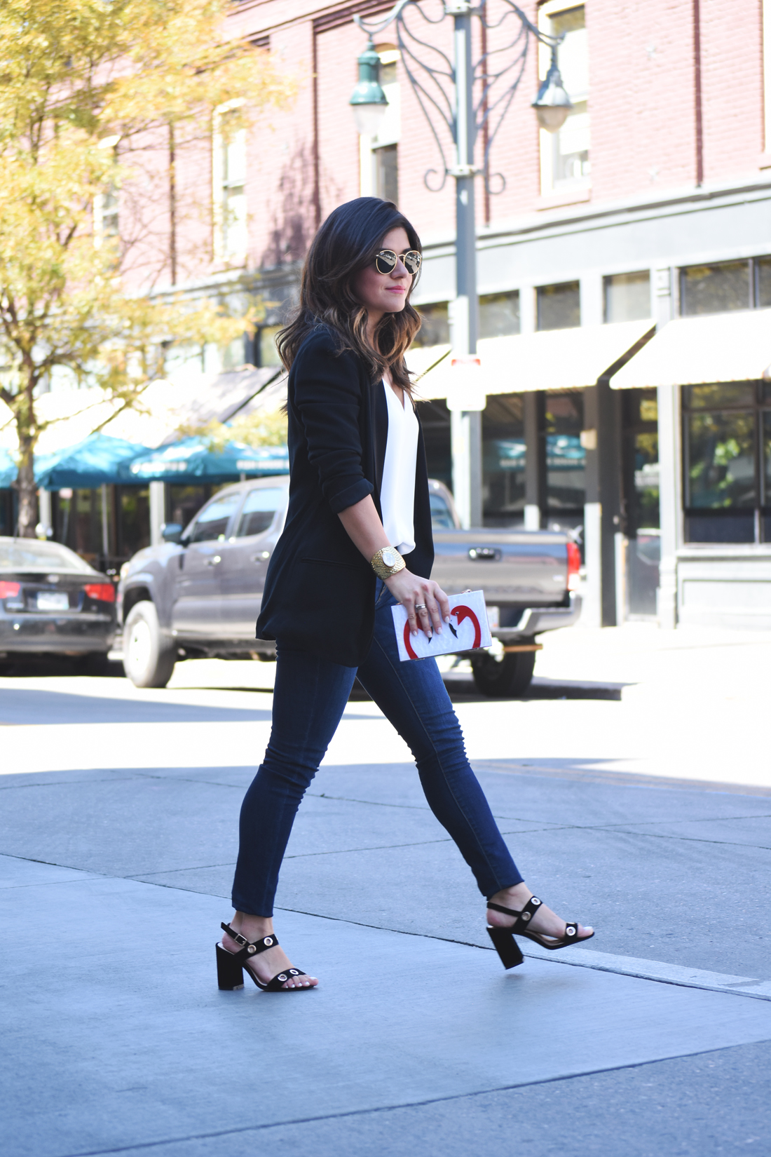 Carolina Hellal of Chic Talk wearing Rayban Rounded sunglasses, an H&M black blazer, a white Topshop top, Public Desire black sandals, and Old Navy jeans. - MY GO-TO CASUAL OUTFIT by popular Denver fashion blogger Chic Talk