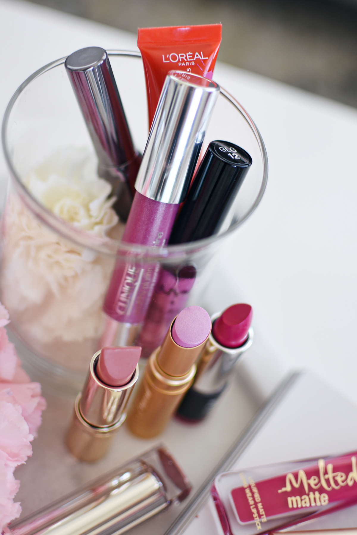 Ulta beauty lips in bloom trend. Lipsticks in pink, orange, magenta and pink rose - LIPS IN BLOOM VIA ULTA LIPSTICKS by popular Denver beauty blogger Chic Talk