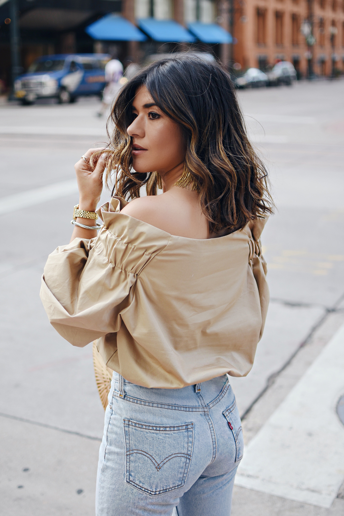 Carolina Hellal of Chic Talk wearing a Style Mafia beige belted top, 501 levis , cultagaia ark bag and steve madden strap sandals - BEIGE BELTED BLOUSE style by popular Denver fashion blogger Chic Talk