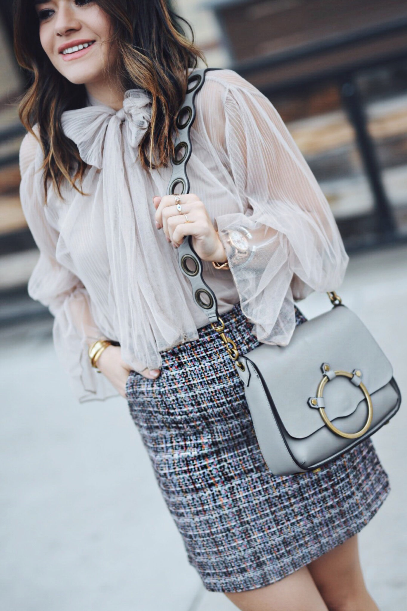 Carolina Hellal of Chic Talk wearing a Chiwish tulle top, Shein tweed skirt, shein gray coat, ASOS red boots and Rebecca Minkoff bag - CHICWISH TULLE TOP by popular Denver fashion blogger Chic Talk