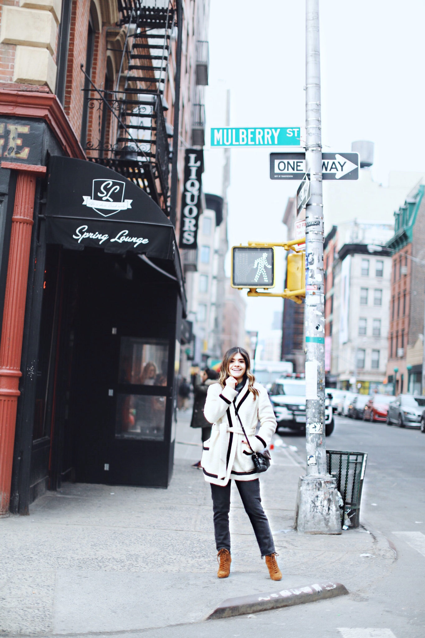 Carolina Hellal of Chic Talk wearing Sezane jacket and boots, YSL Crossbody bag. - NYFW 2018 DAY 2 AND 3 by popular Denver fashion blogger Chic Talk