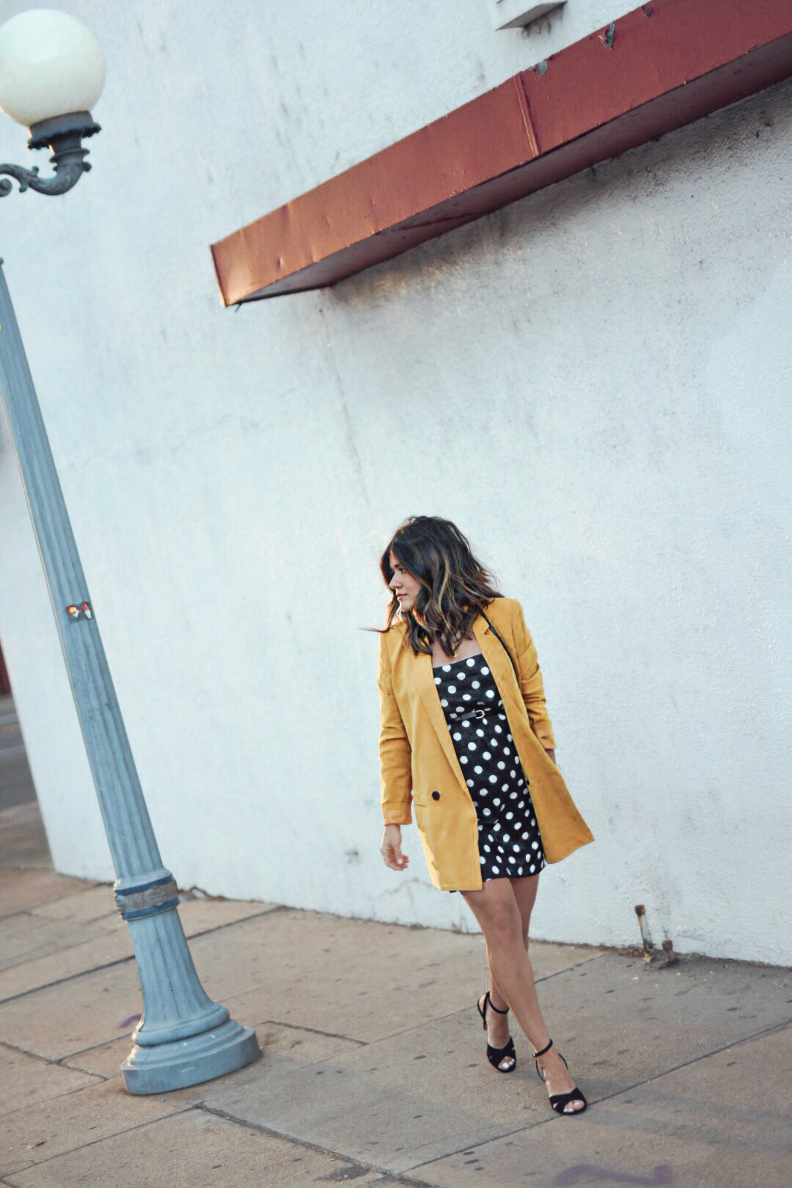 Carolina Hellal of Chic Talk wearing a Topshop polka dot dress, Mural yellow blazer, Sam Edelman sandals and YSL crossbody bag - Spring polka dot dress by popular Denver fashion blogger Chic Talk