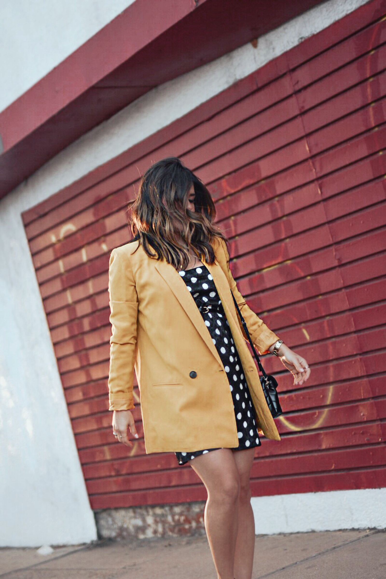 Carolina Hellal of Chic Talk wearing a Topshop polka dot dress, Mural yellow blazer, Sam Edelman sandals and YSL crossbody bag - Spring polka dot dress by popular Denver fashion blogger Chic Talk