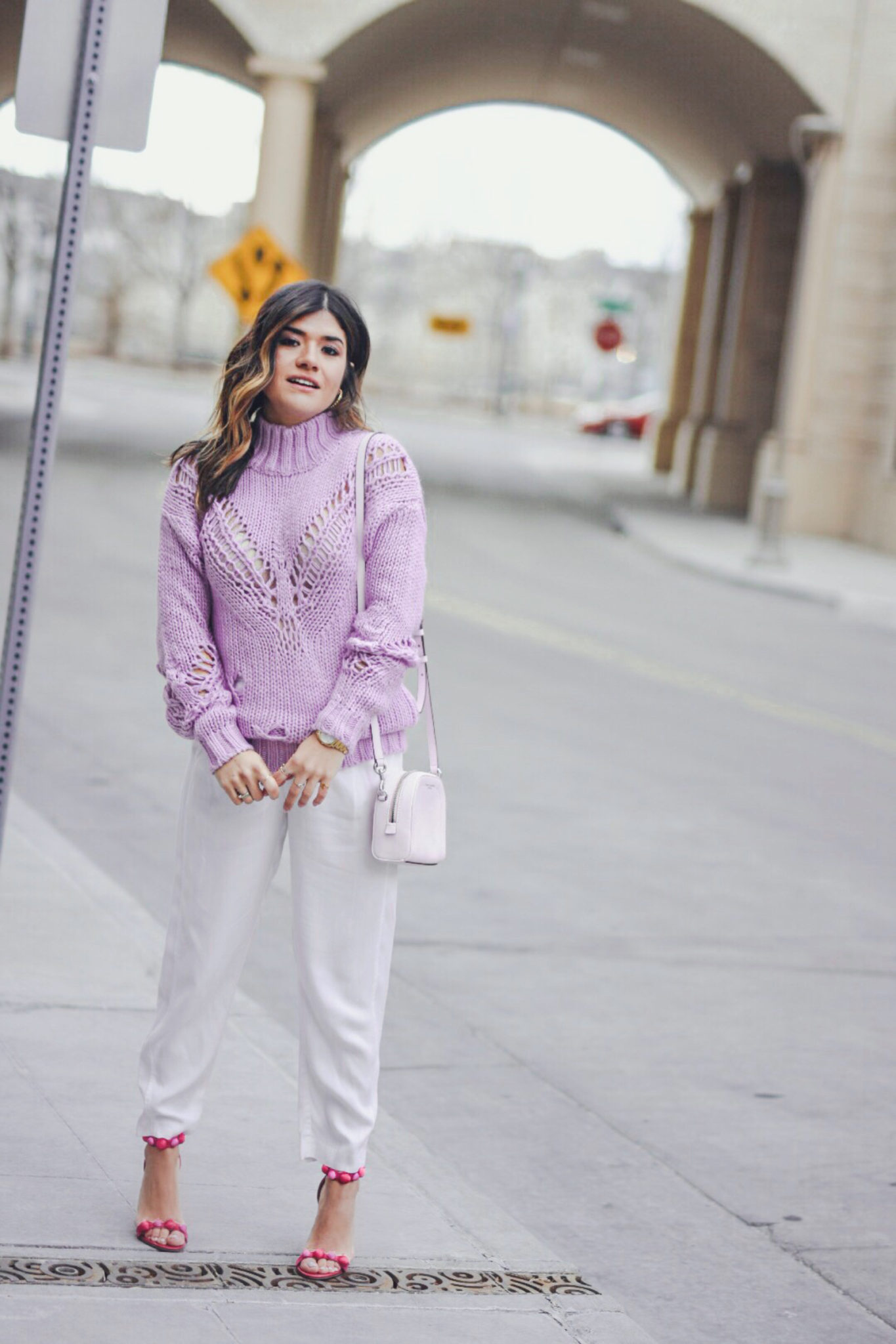 Carolina Hellal of Chic Talk wearing a lavander sweater, white pants, Sam Edelman pink high heels and baby pink Marc Jacobs bag. - SPRING COLOR CHECKLIST: LAVENDER FEVER by popular Denver fashion blogger Chic Talk