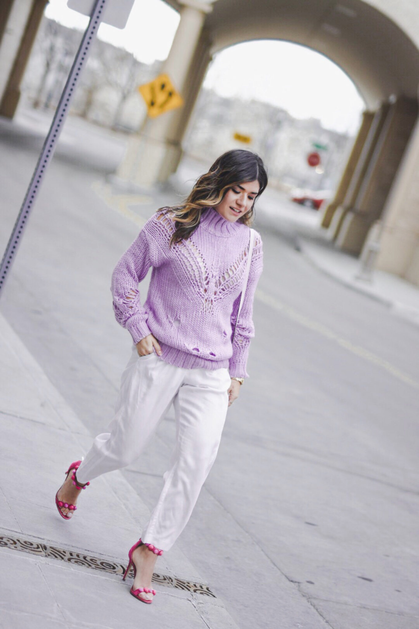 Carolina Hellal of Chic Talk wearing a lavander sweater, white pants, Sam Edelman pink high heels and baby pink Marc Jacobs bag. - SPRING COLOR CHECKLIST: LAVENDER FEVER by popular Denver fashion blogger Chic Talk