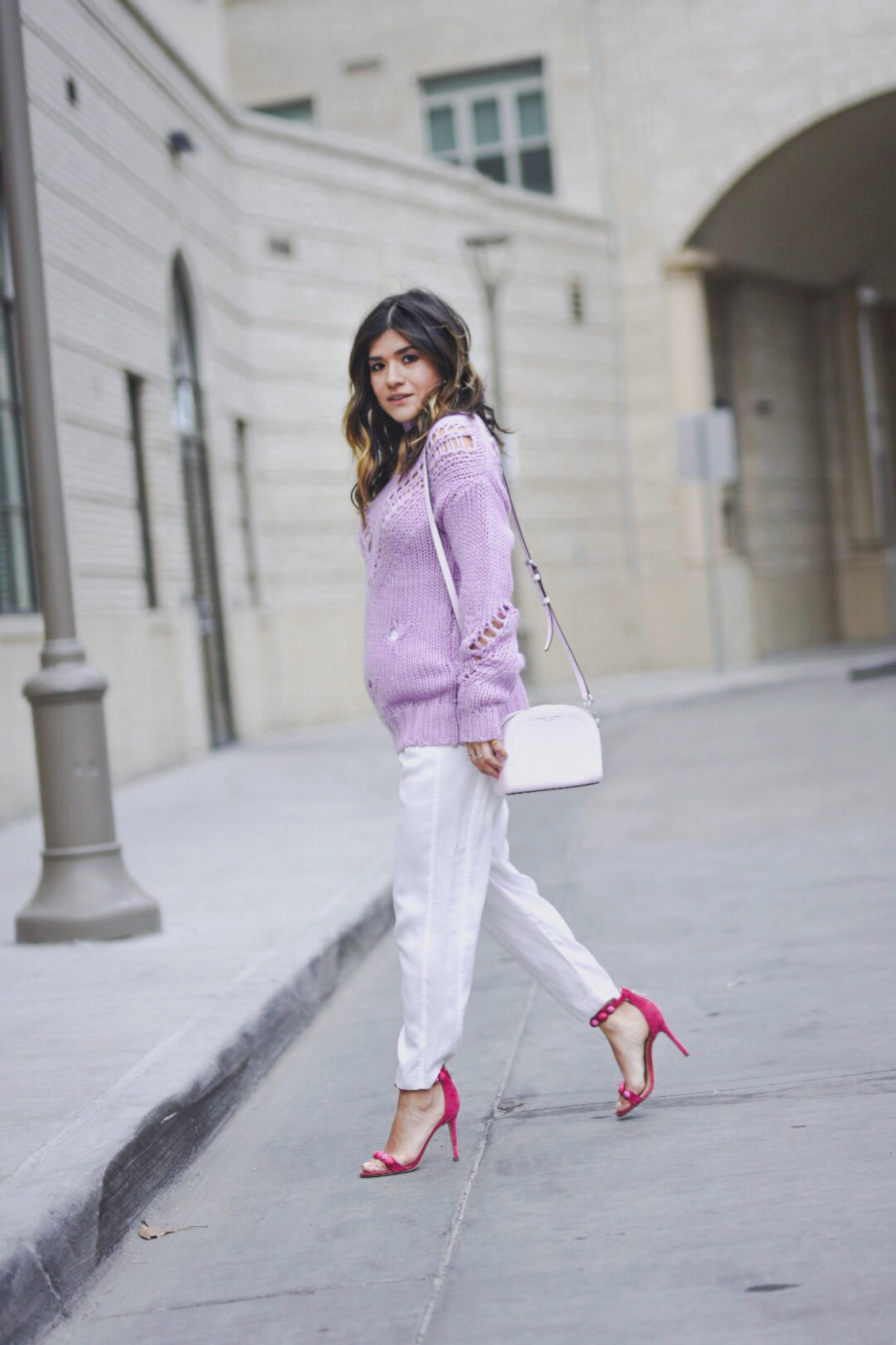 Carolina Hellal of Chic Talk wearing a lavander sweater, white pants, Sam Edelman pink high heels and baby pink Marc Jacobs bag.  - SPRING COLOR CHECKLIST: LAVENDER FEVER by popular Denver fashion blogger Chic Talk