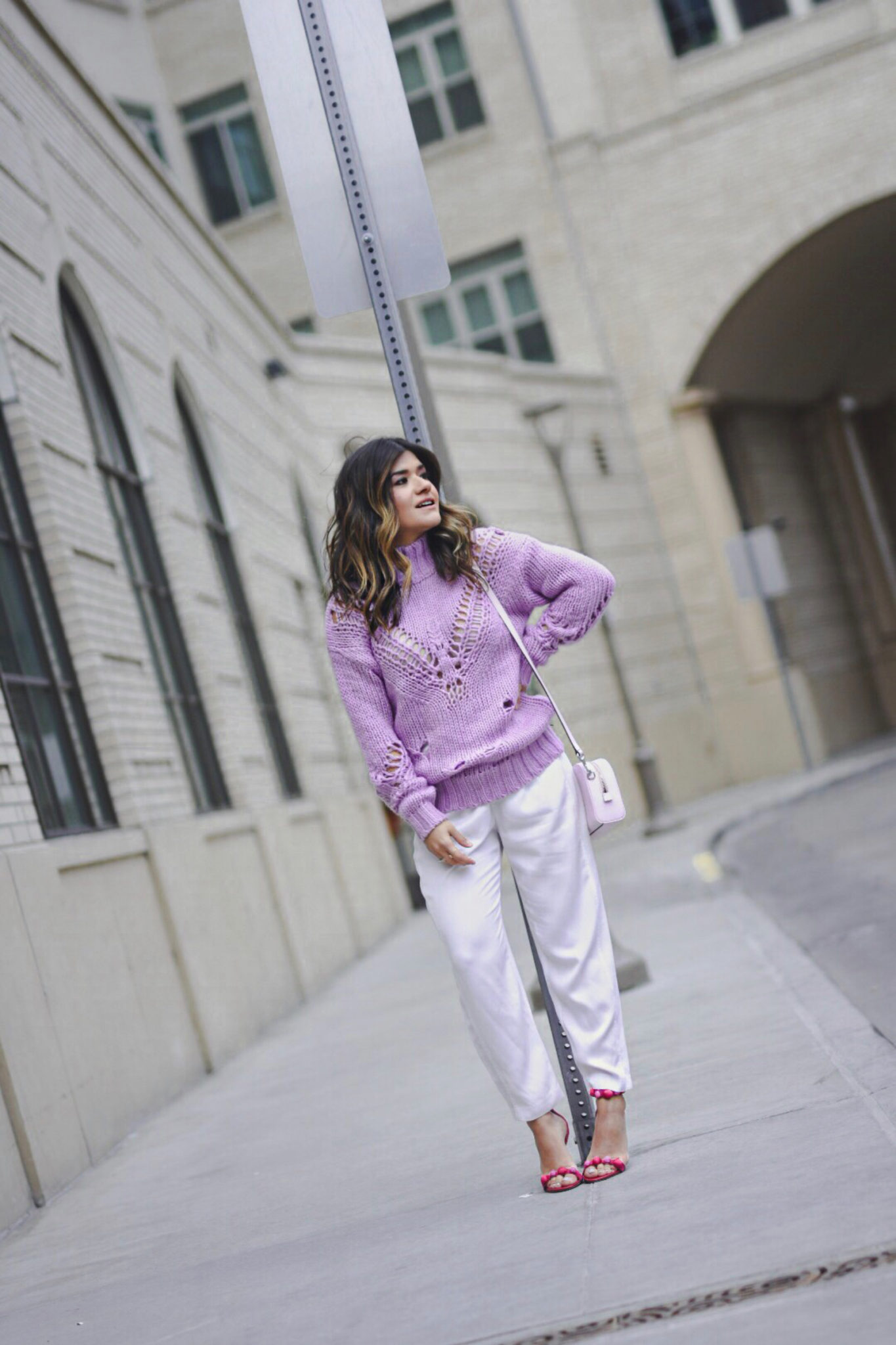 Carolina Hellal of Chic Talk wearing a lavander sweater, white pants, Sam Edelman pink high heels and baby pink Marc Jacobs bag.  - SPRING COLOR CHECKLIST: LAVENDER FEVER by popular Denver fashion blogger Chic Talk