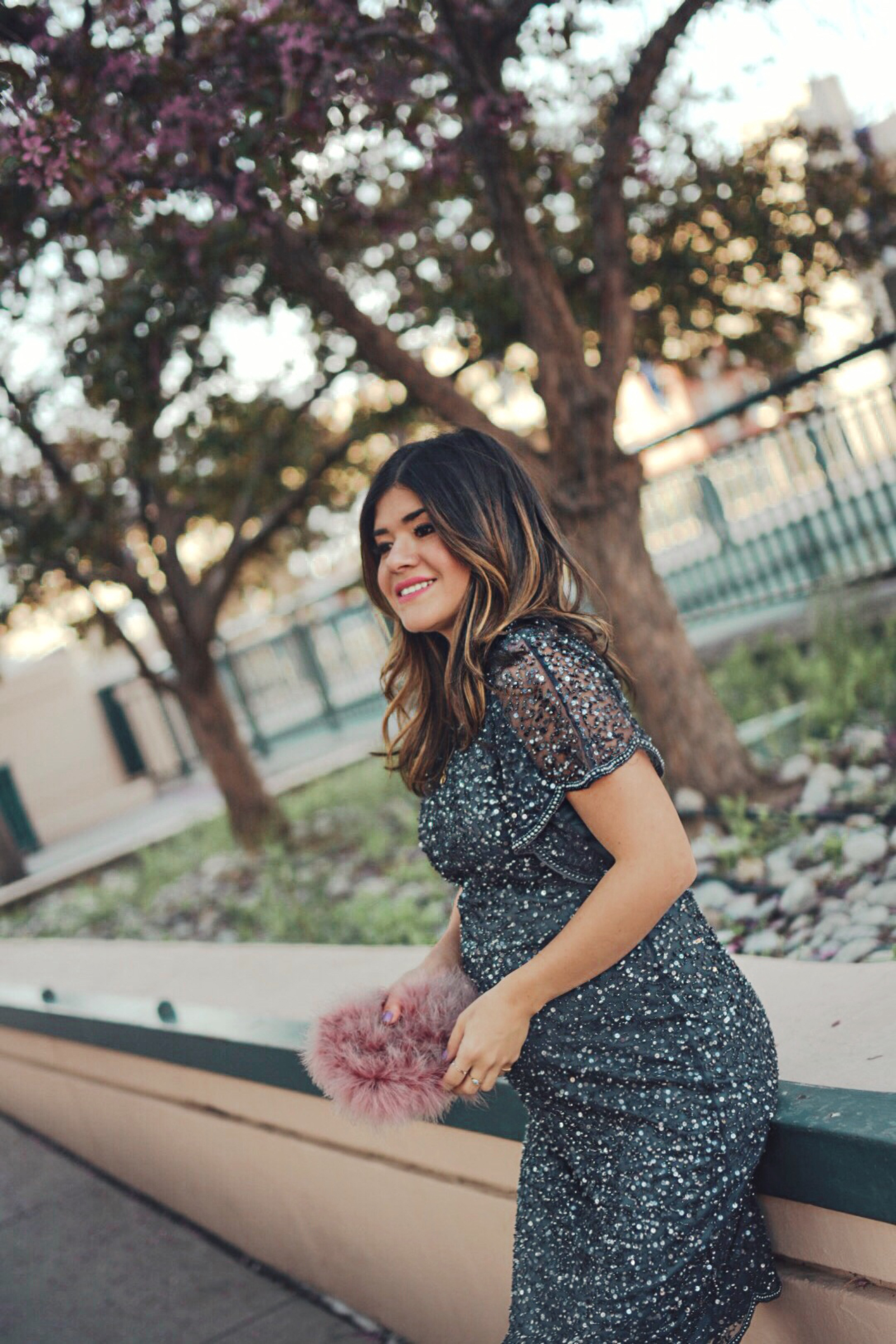 Carolina Hellal of Chic Talk wearing an Adrianna Papell beaded cocktail dress, Nine west grey shoes and topshop feather bag - ADRIANNA PAPELL DRESS styled by popular Denver fashion blogger, Chic Talk