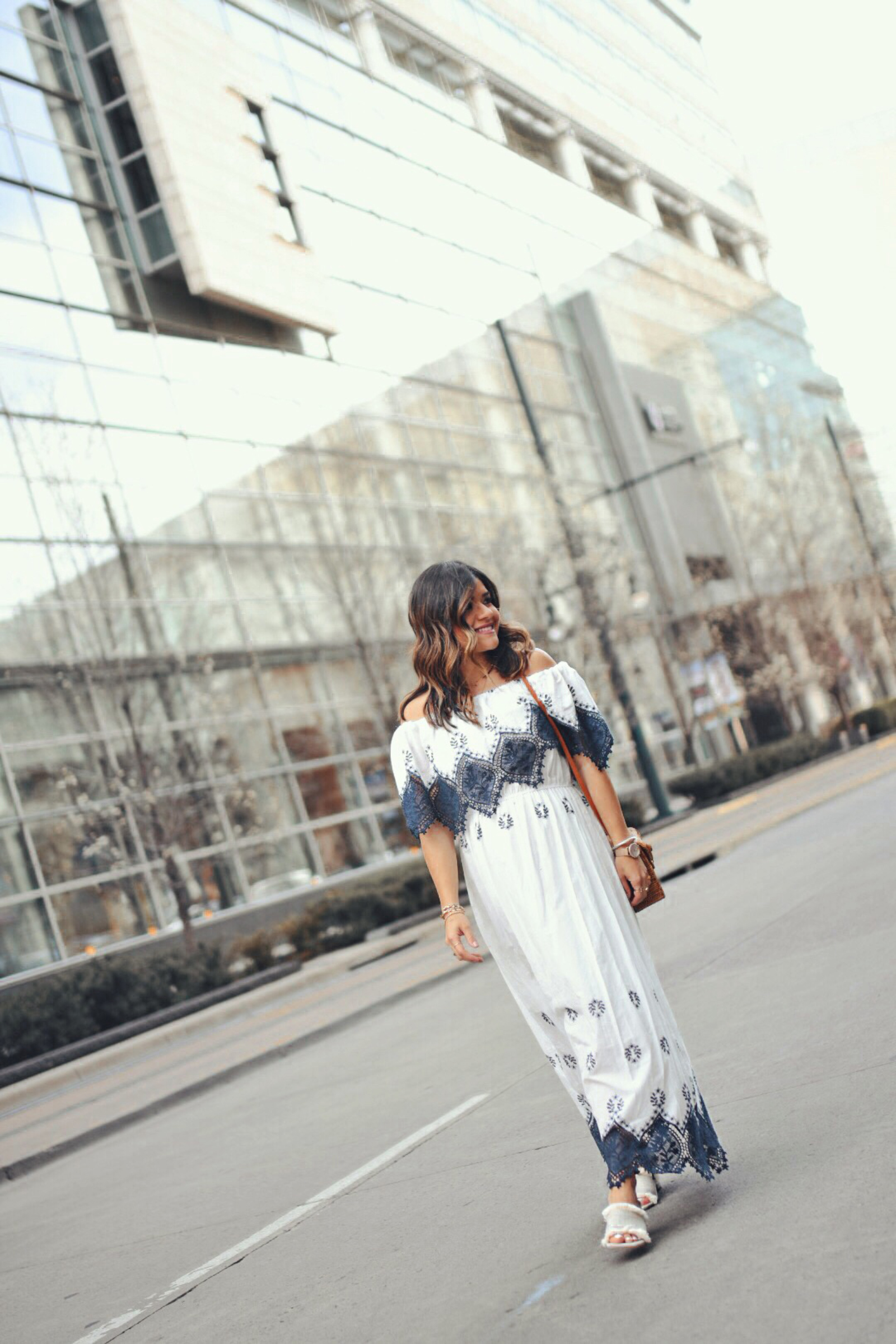 Carolina Hellal wearing a Chicwish maxi dress, woven bag and beige slides - STATEMENT DRESSES featured by popular Denver fashion blogger, Chic Talk