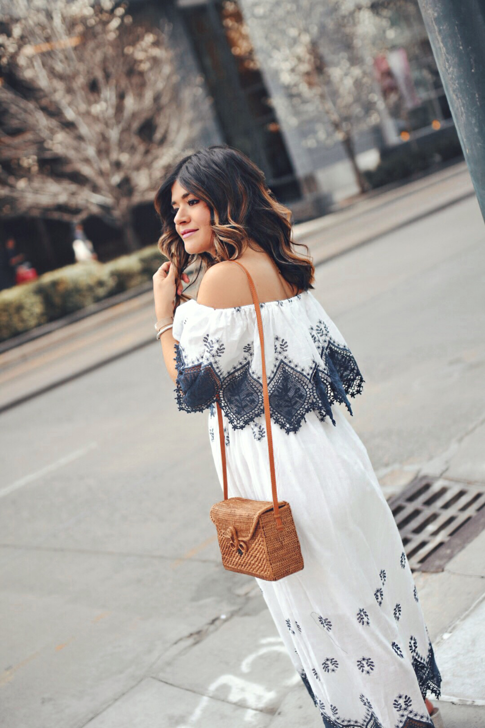 Carolina Hellal wearing a Chicwish maxi dress, woven bag and beige slides - STATEMENT DRESSES featured by popular Denver fashion blogger, Chic Talk