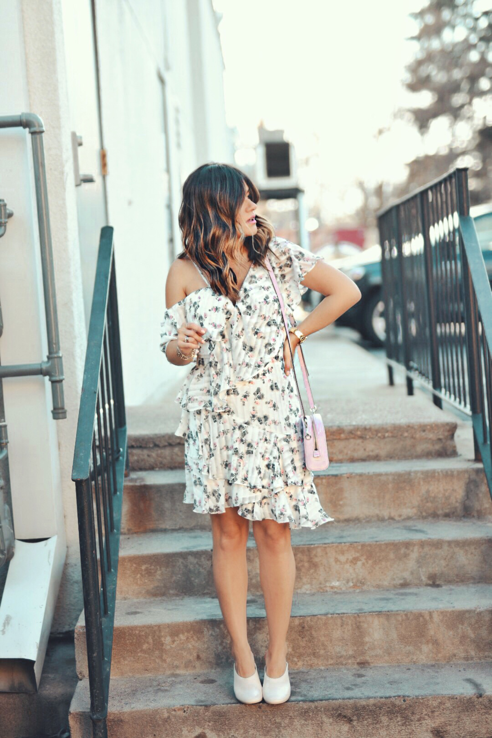 Carolina Hellal of Chic Talk sytling a floral dress via Nordstrom, Dolce Vita white mules, baby pink Marc Jacobs bag and watch and Bauble Bar gold necklace. - THE FLIRTY FLORAL DRESS styled by Denver fashion blogger Chic Talk