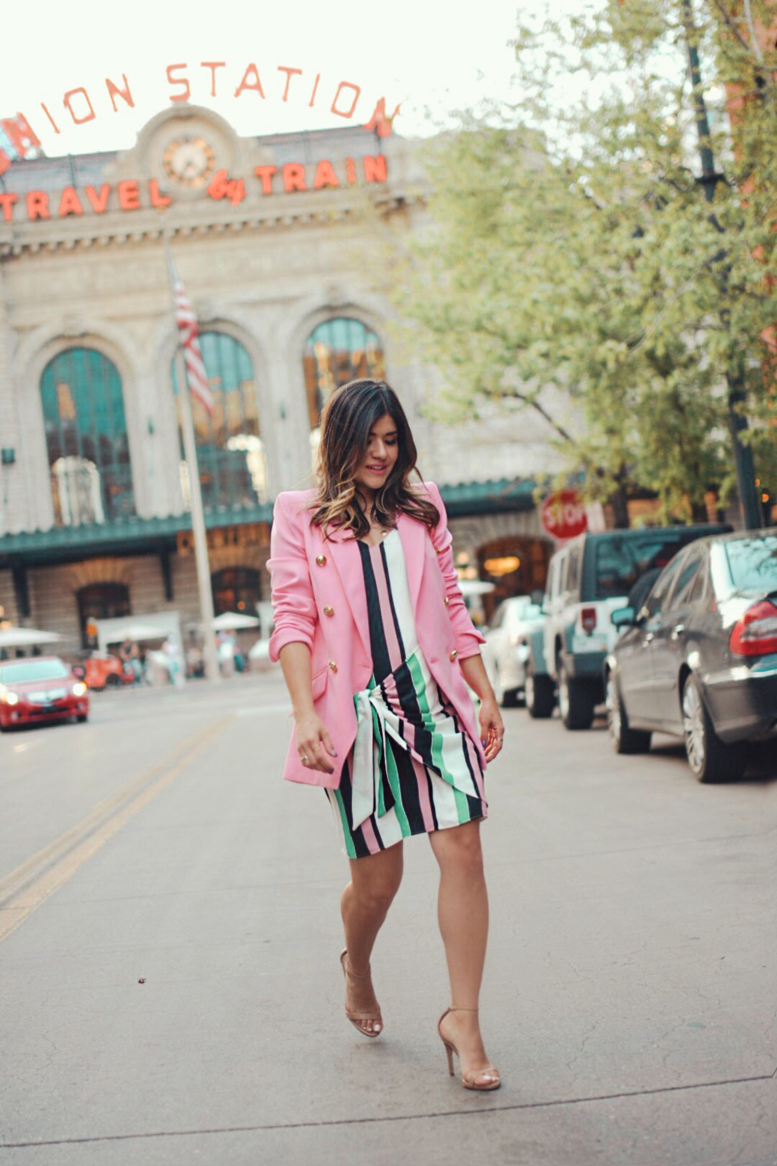 Carolina Hellal of Chic Talk wearing a River Island prink blazer, striped dress and green embellished clutch - THE ULTIMATE SPRING SHOPPING GUIDE by popular Denver fashion blogger, Chic Talk